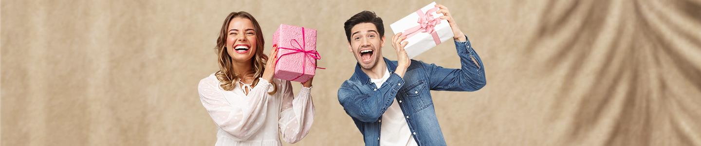 Happy couple with gift boxes